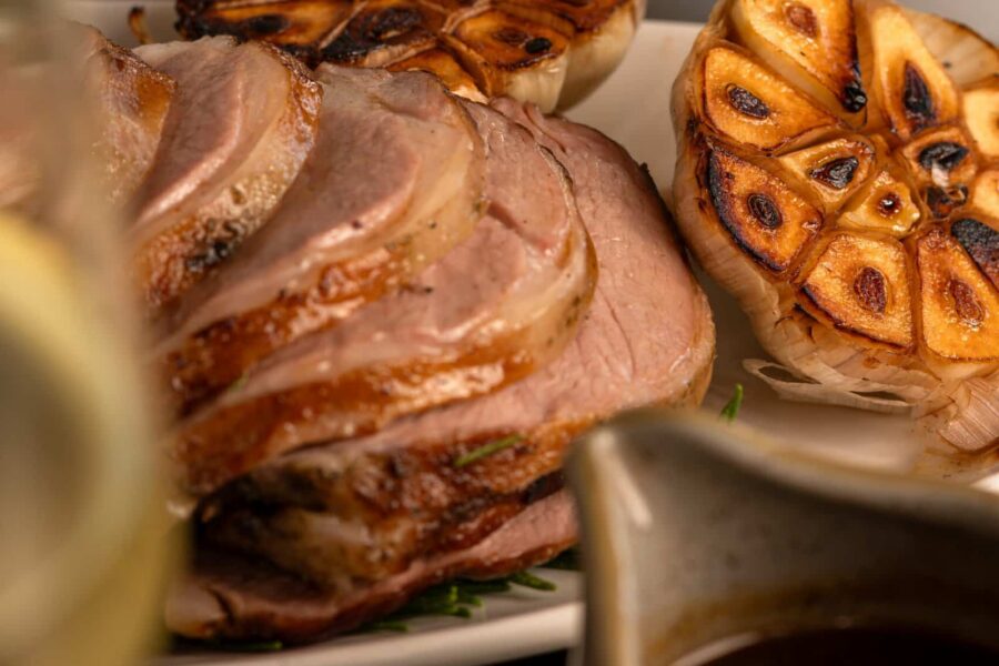 Savour succulent roasted meats and grilled garlic at Palm House Boutique Hotel and Spa, renowned for luxurious accommodations and gourmet dining experiences in South Africa.